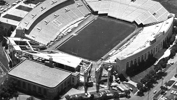 1966 North end zone wings construction Memorial Stadium